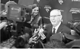  ?? BOB SELF/FLORIDA TIMES-UNION ?? Tom Coughlin talks with reporters in 2017 as the Jags’ new executive vice president of football operations. He’s been mum with the media since, following his “one voice’’ policy.