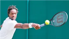  ??  ?? France’s Gael Monfils as he returns against France’s Adrian Mannarino during their men’s singles third round match on the sixth day of the 2017 Wimbledon Championsh­ips at The All England Lawn Tennis Club in Wimbledon, southwest London. - AFP photo