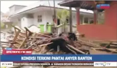  ?? METRO TV ?? A video image shows street debris after a tsunami hit the coast in Serang city, in Banten province, Indonesia.