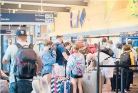  ?? SOFIE BRANDT PHOTOS/HARTFORD COURANT ?? TOP: A plane takes off from Bradley, which has seen a recent spike in leisure travel, helping to put Connecticu­t’s largest airport ahead of its projected recovery in passenger traffic.