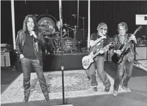  ?? KEVIN WINTER, WIREIMAGE ?? Alice Cooper, left, Matt Sorum, Johnny Depp and Joe Perry of the Hollywood Vampires rehearse for the Grammy Awards.