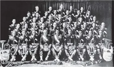  ?? PHOTO: TAIERI HISTORICAL SOCIETY ?? Everyone loves a good pipe band. I think. Anyway, allow me to introduce you to the Argyle and Sutherland Highlander­s Pipe (and Brass?) Band, which may have had links to the 192526 New Zealand and South Seas Exhibition. More below.