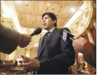  ?? RICH PEDRONCELL­I — THE ASSOCIATED PRESS ?? State Senate President Pro TemKevin de León, D-Los Angeles, talks with reporters Thursday in Sacramento. Lawmakers returned to work this week after a four-month hiatus.