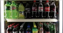  ?? JUSTIN SULLIVAN / GETTY IMAGES 2015 ?? The American Heart Associatio­n says sweetened drinks are the top source of added sugar in our diet. About 40% of adults are obese, the American Medical Associatio­n says.