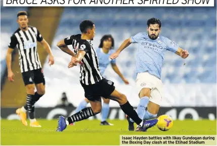  ??  ?? Isaac Hayden battles with Ilkay Gundogan during the Boxing Day clash at the Etihad Stadium