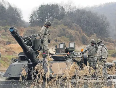  ??  ?? US troops on a military excercise near the border with North Korea.