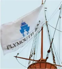  ??  ?? RAISE THE FLAG: The banner for Plymouth 400, which celebrates the upcoming 400th anniversar­y of the Pilgrims’ landing, is raised on board Mayflower II.