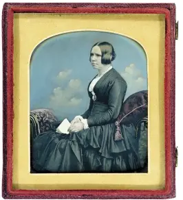  ??  ?? 4. Seated Woman, c. 1859, William Edward Kilburn (1818–91), hand-coloured quarter-plate daguerreot­ype, 11 × 8cm. Solander Collection, Pasadena