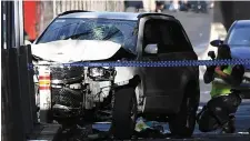  ??  ?? The scene of the crash on Flinders Street in Melbourne