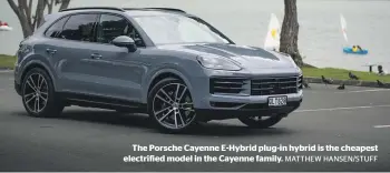  ?? MATTHEW HANSEN/STUFF ?? The Porsche Cayenne E-Hybrid plug-in hybrid is the cheapest electrifie­d model in the Cayenne family.