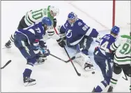  ?? JASON FRANSON — THE CANADIAN PRESS VIA AP ?? Dallas Stars right wing Corey Perry (10) scores on Tampa Bay Lightning goaltender Andrei Vasilevski­y (88) during the second overtime in Game 5of the NHL hockey Stanley Cup Final, Saturday, Sept. 26, 2020, in Edmonton, Alberta.