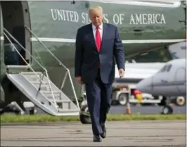  ?? PABLO MARTINEZ MONSIVAIS, ASSOCIATED PRESS ?? President Donald Trump walks across the tarmac from Marine One to board Air Force One at Morristown Municipal Airport in Morristown, N.J.