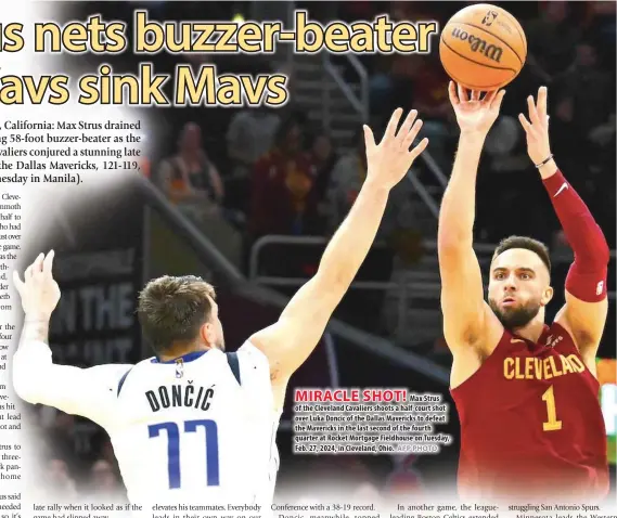  ?? AFP PHOTO ?? MIRACLE SHOT!
Max Strus of the Cleveland Cavaliers shoots a half-court shot over Luka Doncic of the Dallas Mavericks to defeat the Mavericks in the last second of the fourth quarter at Rocket Mortgage Fieldhouse on Tuesday, Feb. 27, 2024, in Cleveland, Ohio.