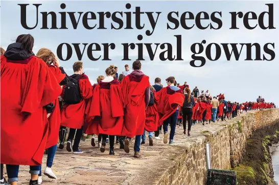  ??  ?? Tradition: Students at St Andrews University wear their iconic red gowns while taking part in the pier walk each Sunday