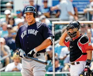  ?? RICHARD GRAULICH / THE PALM BEACH POST ?? Last year’s American League rookie of the year, Yankees outfielder Aaron Judge prepares to hit Sunday at Roger Dean Chevrolet Stadium in Jupiter. Judge had his first homer of the year in the game. Marlins catcher J.T. Realmuto later left the game with...