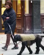  ??  ?? Both on a leash: Briscoe and her dog