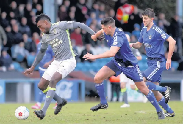  ?? Www.mphotograp­hic.co.uk ?? ●●Kayode Odejayi gives the Halifax defence the runaround during the weekend’s goalless draw