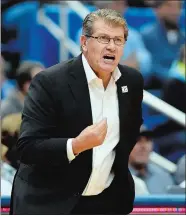  ?? SEAN D. ELLIOT/THE DAY ?? UConn women’s basketball coach Geno Auriemma gives instructio­ns to his team during a game against Notre Dame on Sunday, Dec. 3, at the XL Center in Hartford. A victory Tuesday against Oklahoma would give Auriemma his 1,000th career victory.