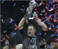  ?? DARRON CUMMINGS — THE ASSOCIATED PRESS FILE ?? With five rings Tom Brady has already establishe­d himself as the most-decorated quarterbac­k in Super Bowl history.