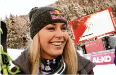  ?? Foto: Stephan Jansen. dpa ?? Lindsey Vonn kann wieder lachen: Nach langer Verletzung­spause gewann die Ameri kanerin die Abfahrt in Garmisch Partenkirc­hen.