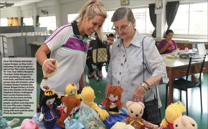  ??  ?? Cork’s Bríd Stack with Sister Louise Horgan, as they visit a workshop for local people as part of the TG4 Ladies Football All-Star Tour 2018 in Bangkok, Thailand. Sister Horgan is an Irish missionary, originally from Cork, and third cousin to...