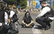  ?? Matt Dunham Associated Press ?? GEORGE FLOYD’S killing fueled global calls to end police brutality. Above, a protest in London last year.