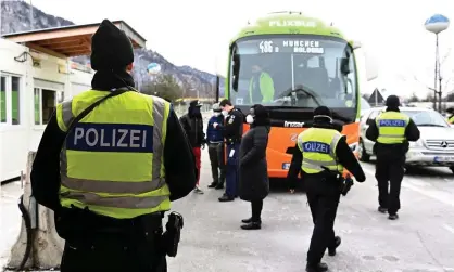  ?? Photograph: Lennart Preiss/ Getty Images ?? German border police speak to bus passengers seeking to enter the country from the Austrian Tirol last week.