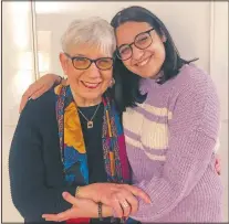  ?? (Courtesy Photo/Laura Shaw Frank) ?? Evelyn Shaw hugs her granddaugh­ter, Ateret Frank, 23, in the Bronx borough of New York. After a year without physical contact, Shaw received a prescripti­on for a hug from her granddaugh­ter after they both received full doses of the covid-19 vaccine, written by a family doctor.