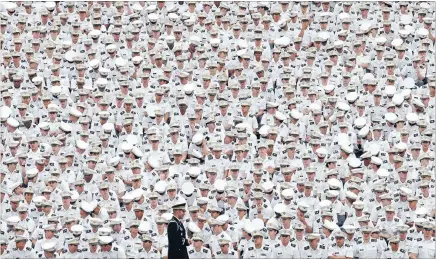  ?? Photos: REUTERS ?? Full attention: Underclass­men listen from the back of the stadium as US President Barack Obama speaks at a commenceme­nt ceremony at the United States Military Academy at West Point.