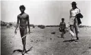  ?? Photograph: Max Raab/Si Litvanoff/Kobal/Rex/ Shuttersto­ck ?? David Gulpilil in Walkabout, 1971, with Jenny Agutter and Luc Roeg, the son of the film’s director, Nicolas Roeg.