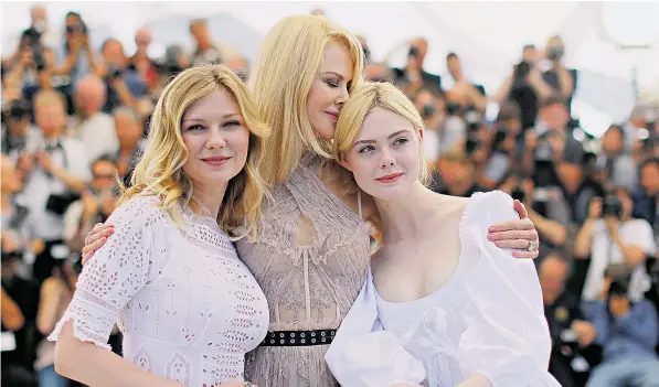  ??  ?? Nicole Kidman is flanked by Kirsten Dunst, left, and Elle Fanning, who all star in Sophia Coppola’s The Beguiled. Kidman is appearing in four works at this year’s festival, including the British TV drama Top of the Lake