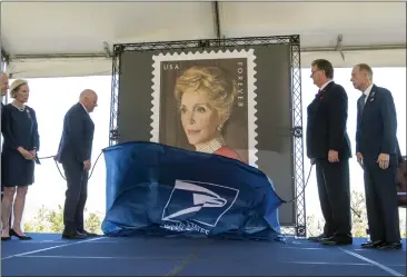  ?? PHOTOS BY HANS GUTKNECHT — STAFF PHOTOGRAPH­ER ?? The Nancy Reagan forever stamp is unveiled during a U.S. Postal Service dedication ceremony honoring the former first lady on what would have been her 101st birthday at the Ronald Reagan Presidenti­al Library and Museum in Simi Valley.