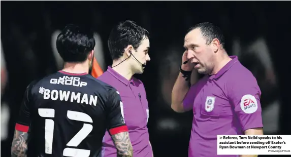  ?? Phil Mingo/PPAUK ?? Referee, Tom Neild speaks to his assistant before sending off Exeter’s Ryan Bowman at Newport County