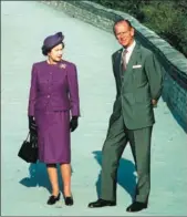  ?? ANWAR HUSSEIN / PA PHOTOS ?? Queen Elizabeth II and Prince Philip on the Great Wall of China in 1986.