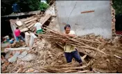  ?? ASSOCIATED PRESS ?? MEN REMOVE SALVAGEABL­E materials from a home destroyed in Thursday’s magnitude 8.1 earthquake, in Union Hidalgo, Oaxaca state, Mexico, Sunday.