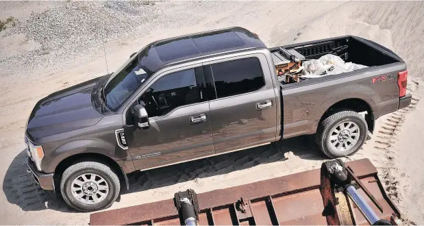 ?? PHOTOS: DEREK MCNAUGHTON/DRIVING.CA ?? The 2018 Ford F-250 Super Duty can tow 15,000 pounds while the driver is ensconced in a cushy interior.