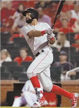  ?? AP PHOTO ?? BETTER LATE: Chris Young watches his RBI single in the top of the 13th inning, which drove home Mitch Moreland as the Red Sox completed a comeback from a four-run deficit and beat the Cardinals, 5-4, last night in St. Louis.