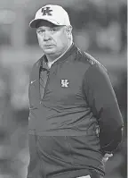  ?? JAMIE RHODES/USA TODAY SPORTS ?? Kentucky coach Mark Stoops’ bonus is $750,000 for 2018 and could rise to $1 million.