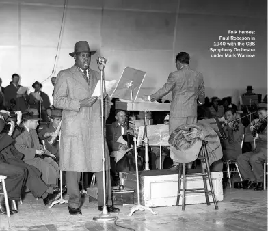  ??  ?? Folk heroes: Paul Robeson in 1940 with the CBS Symphony Orchestra under Mark Warnow