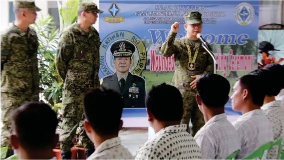  ?? (JOEY P. NACALABAN) ?? IN THIS FILE PHOTO, former AFP Chief of Staff Eduardo Ano then brags before the wounded soldiers at Camp Evangelist­a army hospital here, saying “After Maute, next in our target will be the Abu Sayaf and the BIFF then the New People’s Army (NPA). We...