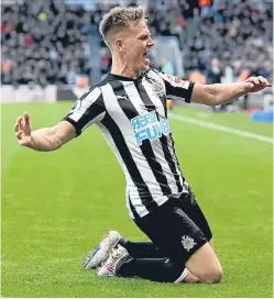  ?? Picture: PA. ?? Matt Ritchie celebrates the goal that gave Newcastle victory over Manchester United at St James’ Park.