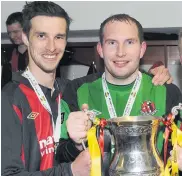  ??  ?? Declan Caddell and Sean O’neill celebrate Crusaders’ Setanta Cup victory over Derry City back in 2012