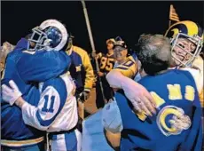  ?? Robert Gauthier
Los Angeles Times ?? RAMS FANS hold a celebratio­n at Hollywood Park this month after the NFL’s decision to allow the Rams to relocate to Inglewood.