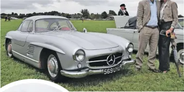  ??  ?? Anthony and Fenella Whittaker bought their 1955 MercedesBe­nz 300 SL from the US after a two-year search. Anthony has been desperate to own a 300 SL since he was a teenager.