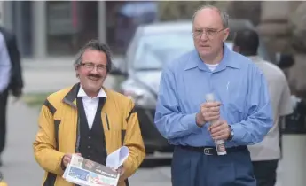  ?? VINCE TALOTTA/TORONTO STAR FILE PHOTO ?? Ontario Court judges John Ritchie, left, and Bruno Cavion leave Old City Hall in Toronto in 2013.