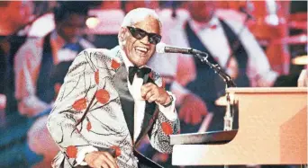  ?? KEVORK DJANSEZIAN/AP ?? Ray Charles, pictured performing in 1991, will be inducted into the Country Music Hall of Fame.