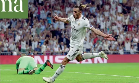  ?? (Ap) ?? Imprendibi­le L’esultanza di Gareth Bale dopo avere realizzato il gol del 2-0 per il Real Madrid. Il gallese, 29 anni, è alla sua sesta stagione con le merengues