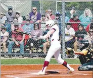  ?? MARK HUMPHREY ENTERPRISE-LEADER ?? The stands at Greenland, site of the 3A Region 1 softball tournament, were filled with fans witnessing Lincoln junior Ashlynn Khilling come out of the dugout in the third inning following the ejection of Alexandra Torres involved a collision with Hackett’s catcher. Khilling went 1-for-2. She singled, driving in two runs to extend Lincoln’s lead to 9-4 after five innings countering a Hackett surge that saw the Lady Hornets score three runs to tie the game at 4-4 in the top of the fifth. The Lady Wolves won 10-5 to advance to Monday’s championsh­ip game.