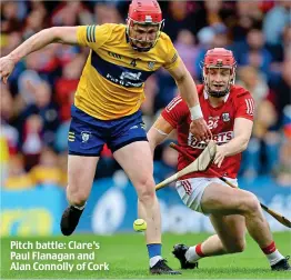  ?? ?? Pitch battle: Clare’s Paul Flanagan and Alan Connolly of Cork