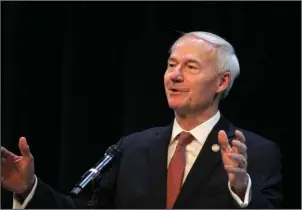  ?? The Sentinel-Record/Richard Rasmussen ?? GOVERNOR SPEAKS: Arkansas Gov. Asa Hutchinson addresses lawyers at the Arkansas Bar Associatio­n’s 120th annual meeting Friday at the Hot Springs Convention Center.